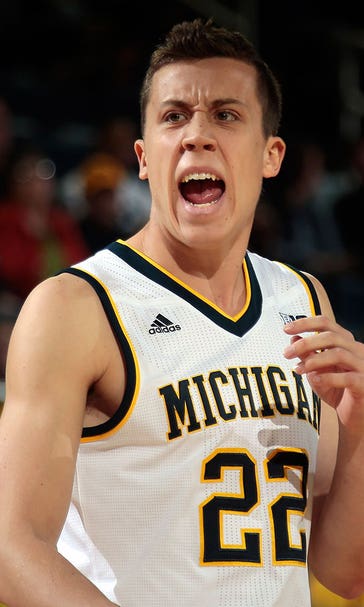 Robinson has perfect shooting night as No. 24 Michigan routs Elon